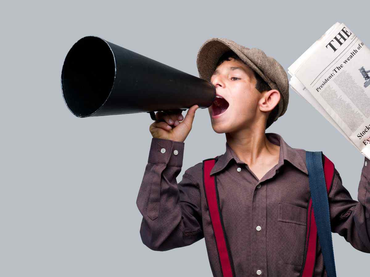 Ragazzo che vende i giornali 